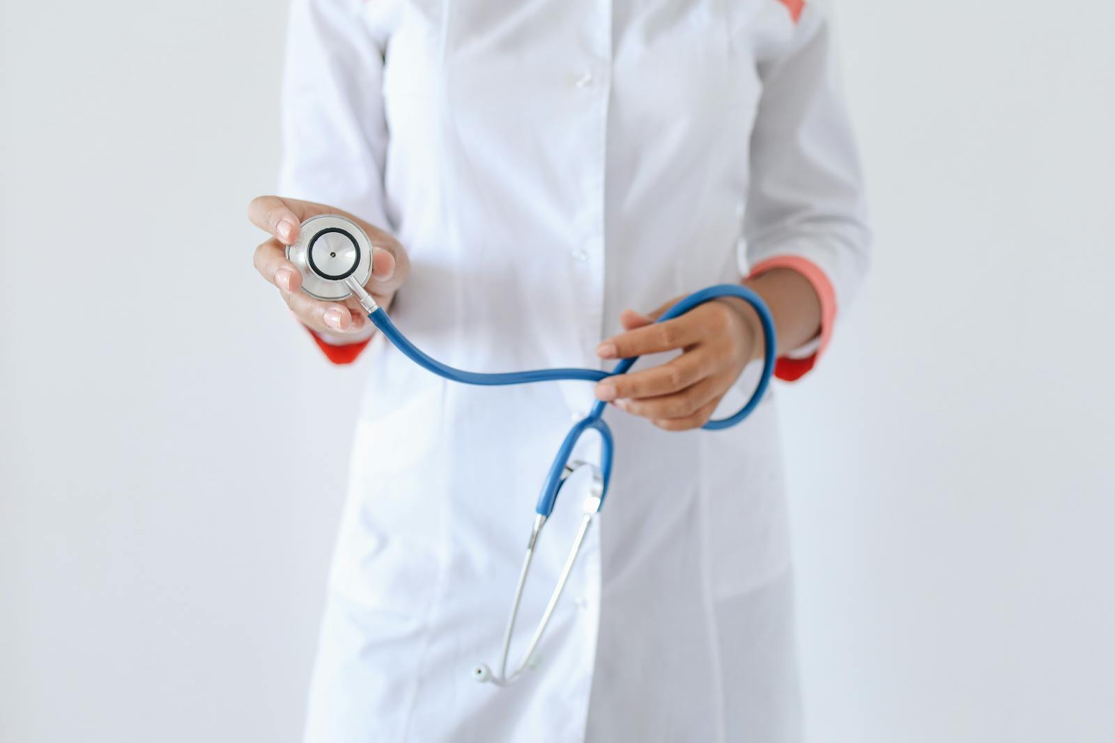 Professional doctor with a stethoscope, focusing on healthcare and medical services.